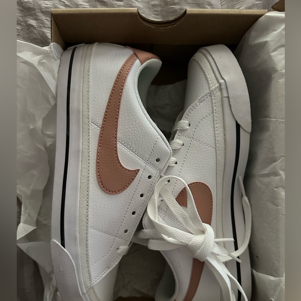 Nike White and Pink Sneakers women’s court legacy